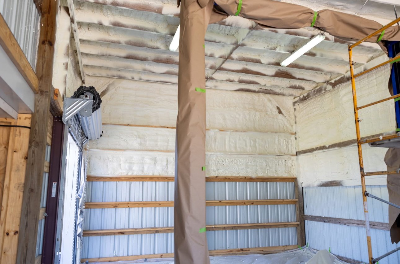 Metal building spray foam insulation job South Louisiana — walls and ceiling fully sealed